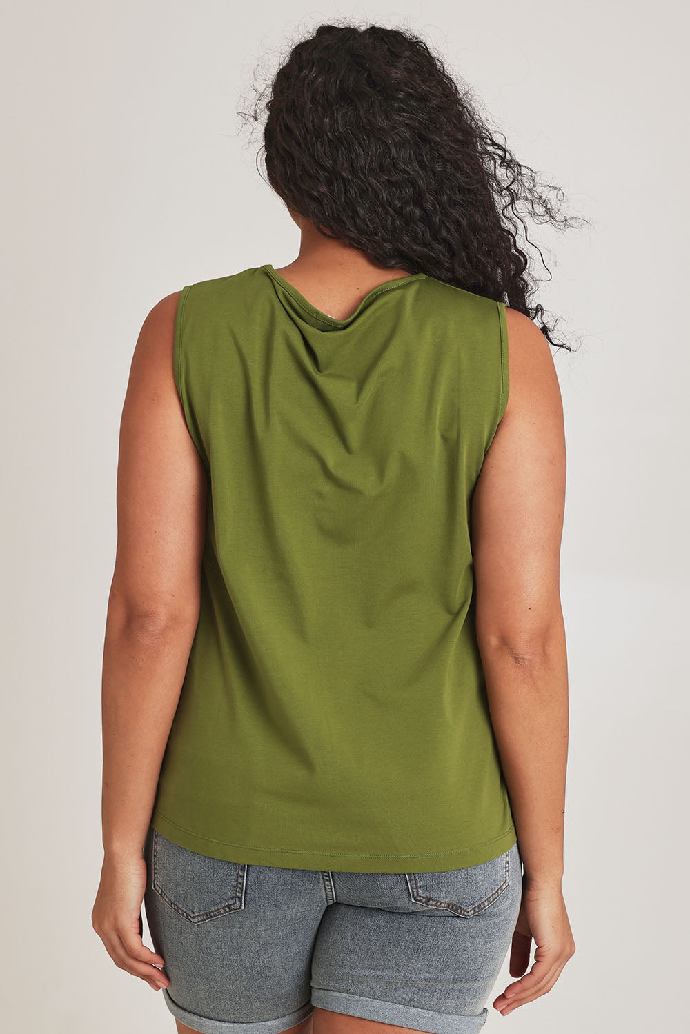 Model Terri-Leigh wearing size 14 of The Keepers Cotton Tank in colour Avocado (Green), from the back