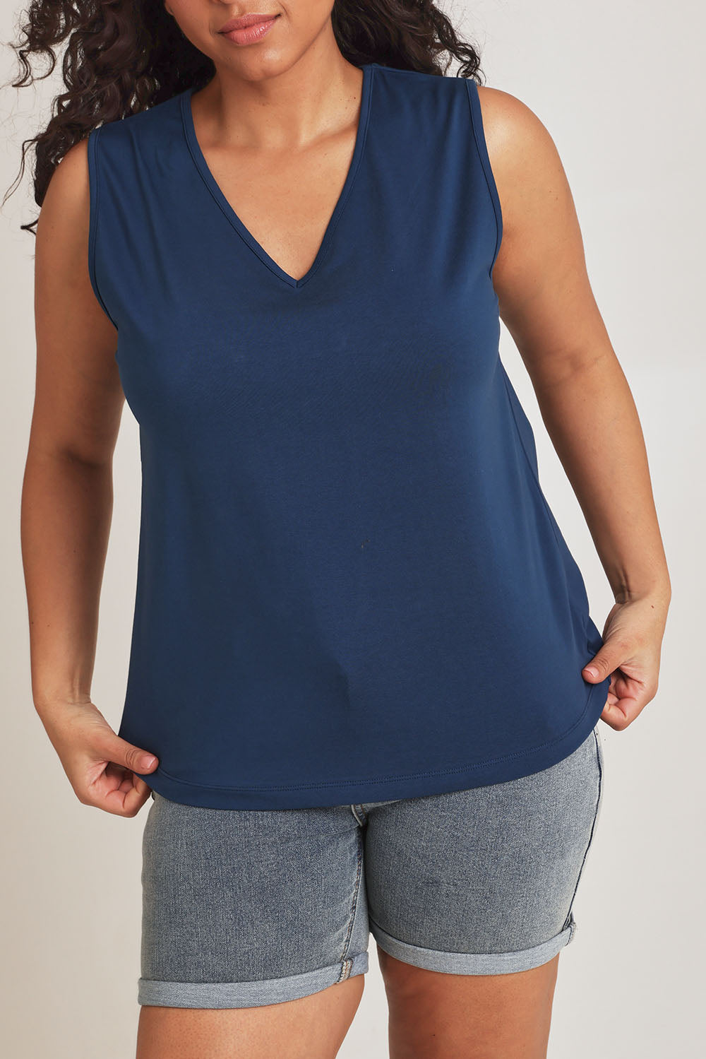 Model Terri-Leigh wearing size 14 of The Keepers Cotton Tank in colour Frenchblue (Blue), from the front, cropped image