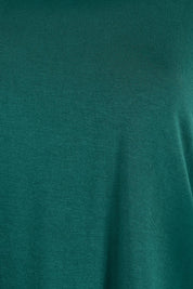 Product shot of the The Bamboo Curved Hem Tee – Forest in colour Forest, showing detail