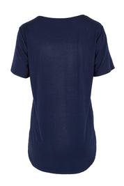 Product shot of the The Bamboo Curved Hem Tee – Navy in colour Navy, from the back