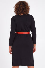 Model Anucia wearing size L of The Transeasonal Knit Dress in colour Black (Black), from the back