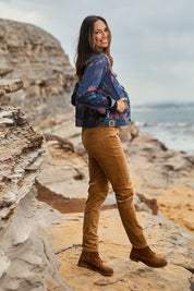 Model Amanda wearing size 10 of The Keepers Printed Denim Jacket in colour Redfloral (Blue), from the front, showing the whole outfit