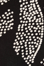 Product shot of The Printed High Low Dress in colour Blackwhite (Black), detail