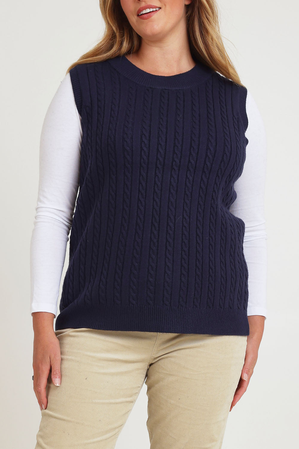 Model Chanel wearing size XL of The Soft Sleeveless Cable Knit Jumper in colour Richnavy (Blue), from the front, cropped image