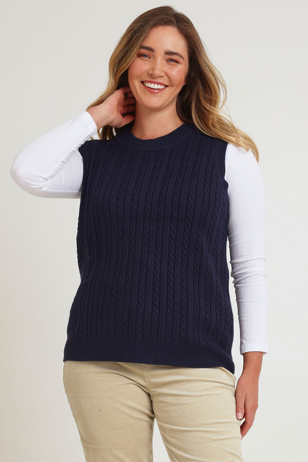 Model Chanel wearing size XL of The Soft Sleeveless Cable Knit Jumper in colour Richnavy (Blue), from the front, cropped image