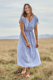 Model Amanda wearing size 10 of The Drawstring Printed Maxi Dress in colour Wedgewood (Blue), from the front, showing the whole outfit
