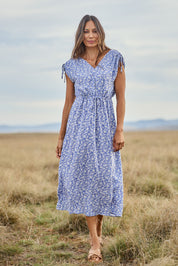 Model Amanda wearing size 10 of The Drawstring Printed Maxi Dress in colour Wedgewood (Blue), from the front, showing the whole outfit