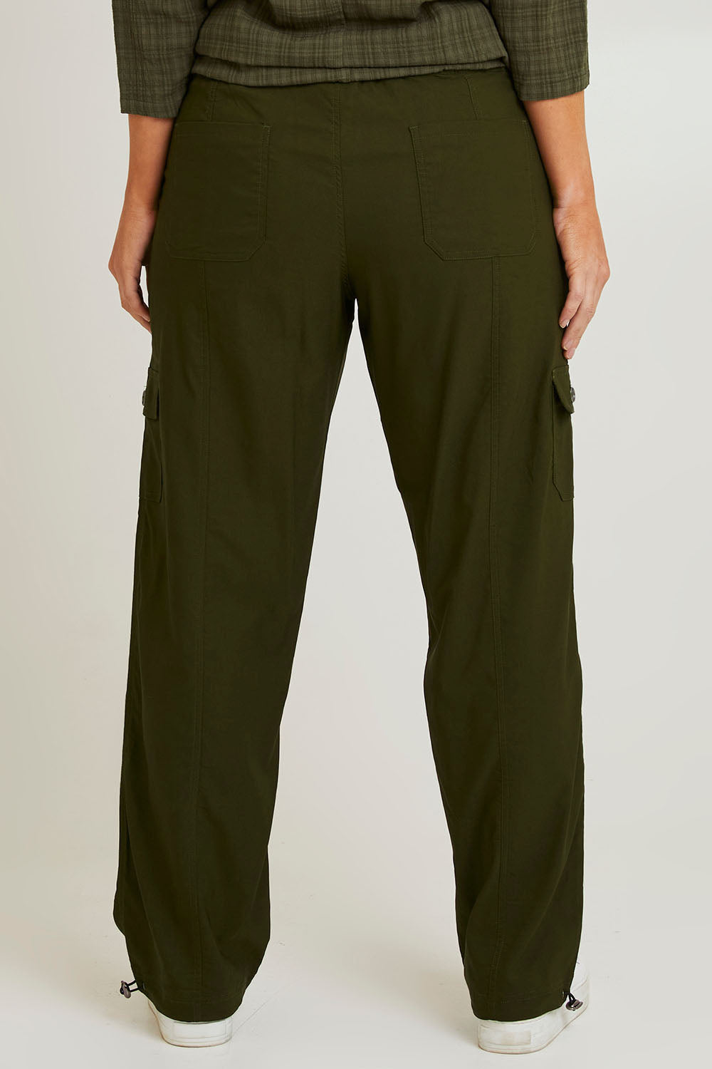Model Laura wearing size 14 of The Everyday Full Length Cargo Pant in colour Olive (Green), from the back
