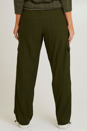 Model Laura wearing size 14 of The Everyday Full Length Cargo Pant in colour Olive (Green), from the back