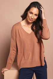 Model Amanda wearing size S of The High Low V Neck Jumper in colour Mushroom, from the front, cropped image
