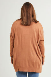 Model Monique wearing size L of The High Low V Neck Jumper in colour Mushroom, from the back