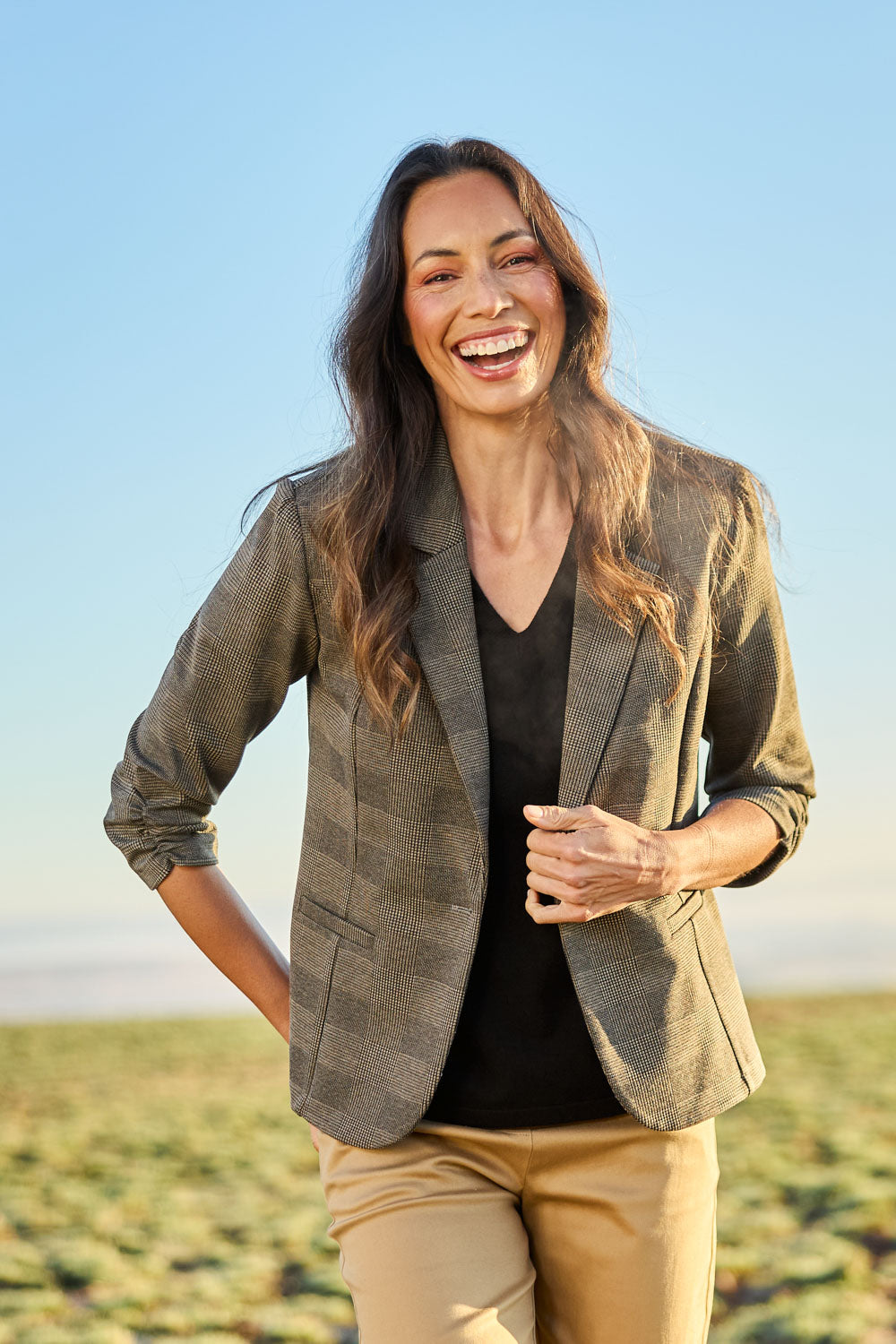 Model Amanda wearing size 10 of The Keepers Houndstooth Blazer in colour Camelblack (Black), from the front, showing the whole outfit