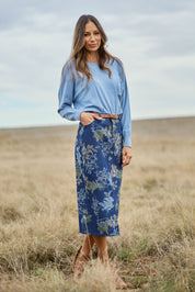Model Amanda wearing size 10 of The 5 Pocket Printed Midi Skirt in colour Winterblue (Blue), from the front, showing the whole outfit