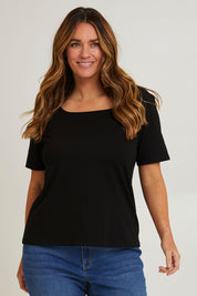 Model Laura wearing size 14 of The Keepers Square Neck Tee in colour Black (Black), from the front, cropped image
