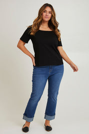 Model Laura wearing size 14 of The Keepers Square Neck Tee in colour Black (Black), from the front, showing the whole outfit
