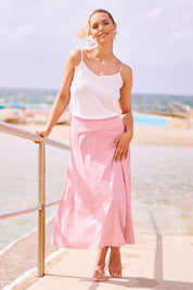 Model Phoebe wearing size 10 of The Bamboo Blend Print Fit & Flare Skirt in colour Pinkblush (Pink), from the front, showing the whole outfit