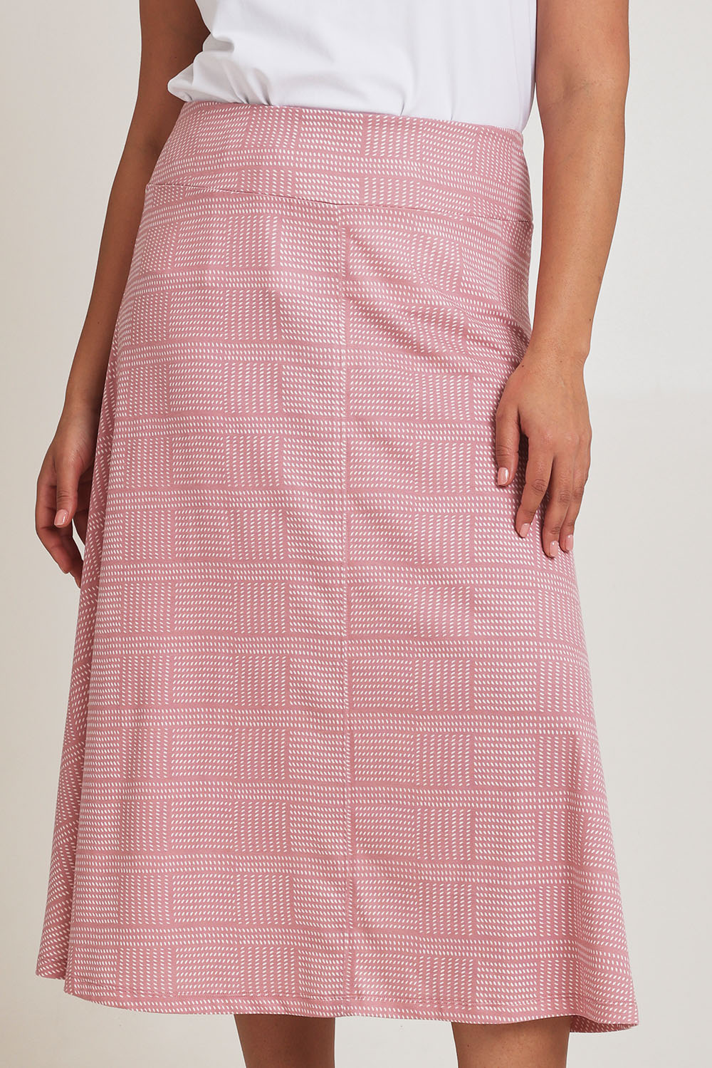 Model Terri-Leigh wearing size 14 of The Bamboo Blend Print Fit & Flare Skirt in colour Pinkblush (Pink), from the front, cropped image
