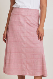 Model Terri-Leigh wearing size 14 of The Bamboo Blend Print Fit & Flare Skirt in colour Pinkblush (Pink), from the front, cropped image