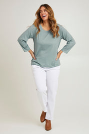 Model Laura wearing size 14 of The Bamboo Blend Printed 3/4 Slv Tee in colour Aquaspot (Green), from the front, showing the whole outfit