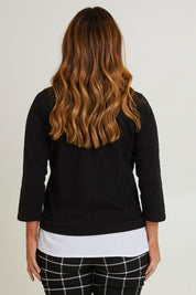 Model Laura wearing size 14 of The Keepers Layered Tee in colour Black (Black), from the back