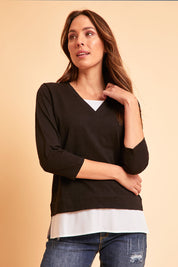 Model Madeline wearing size 10 of The Keepers Layered Tee in colour Black (Black), from the front, showing the whole outfit