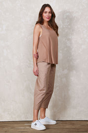Model Madeline wearing size 10 of The Keepers Side Pocket Pant in colour Sand, from the front, showing the whole outfit