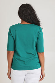Model Terri-Leigh wearing size 14 of The Luxe Pima Cotton Tee in colour Grassgreen (Green), from the back