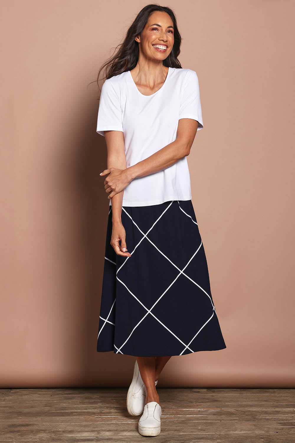 Model Amanda wearing size 10 of The Luxe Pima Cotton Tee in colour White (White), from the front, showing the whole outfit