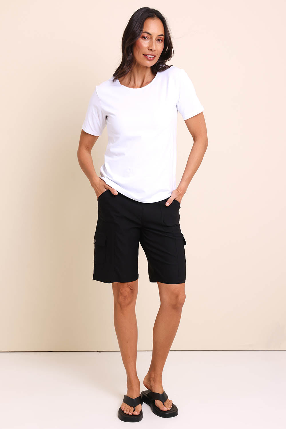 Model Amandam wearing size 10 of the The Utility Shorts  - Black in colour Black, from the front