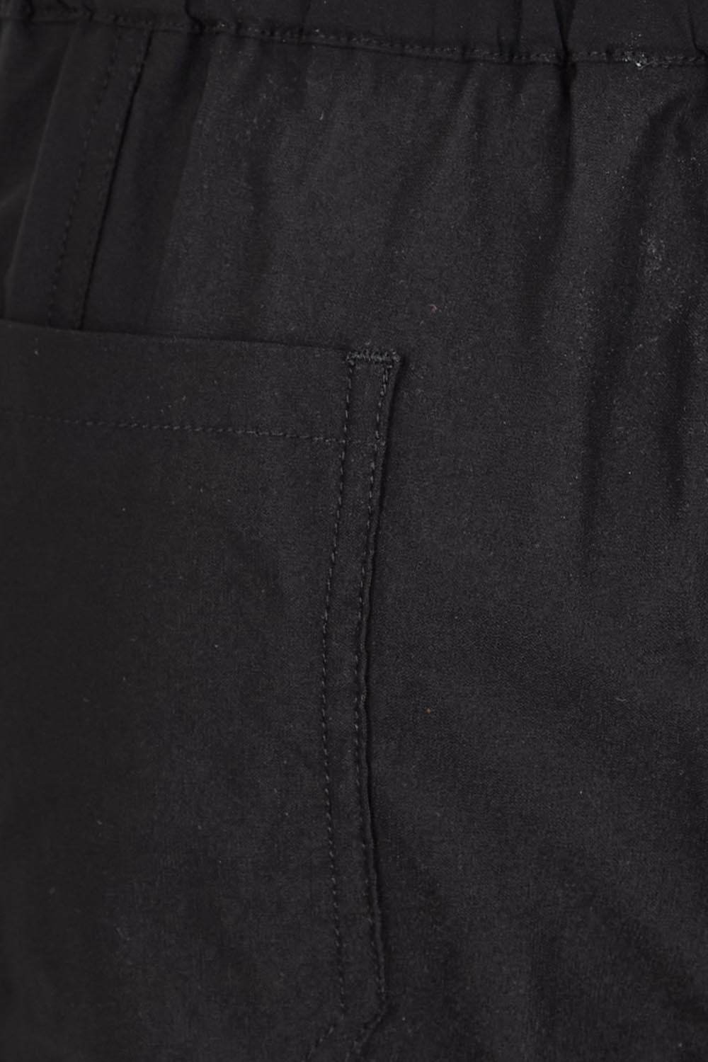Product shot of the The Utility Shorts  - Black in colour Black, showing detail
