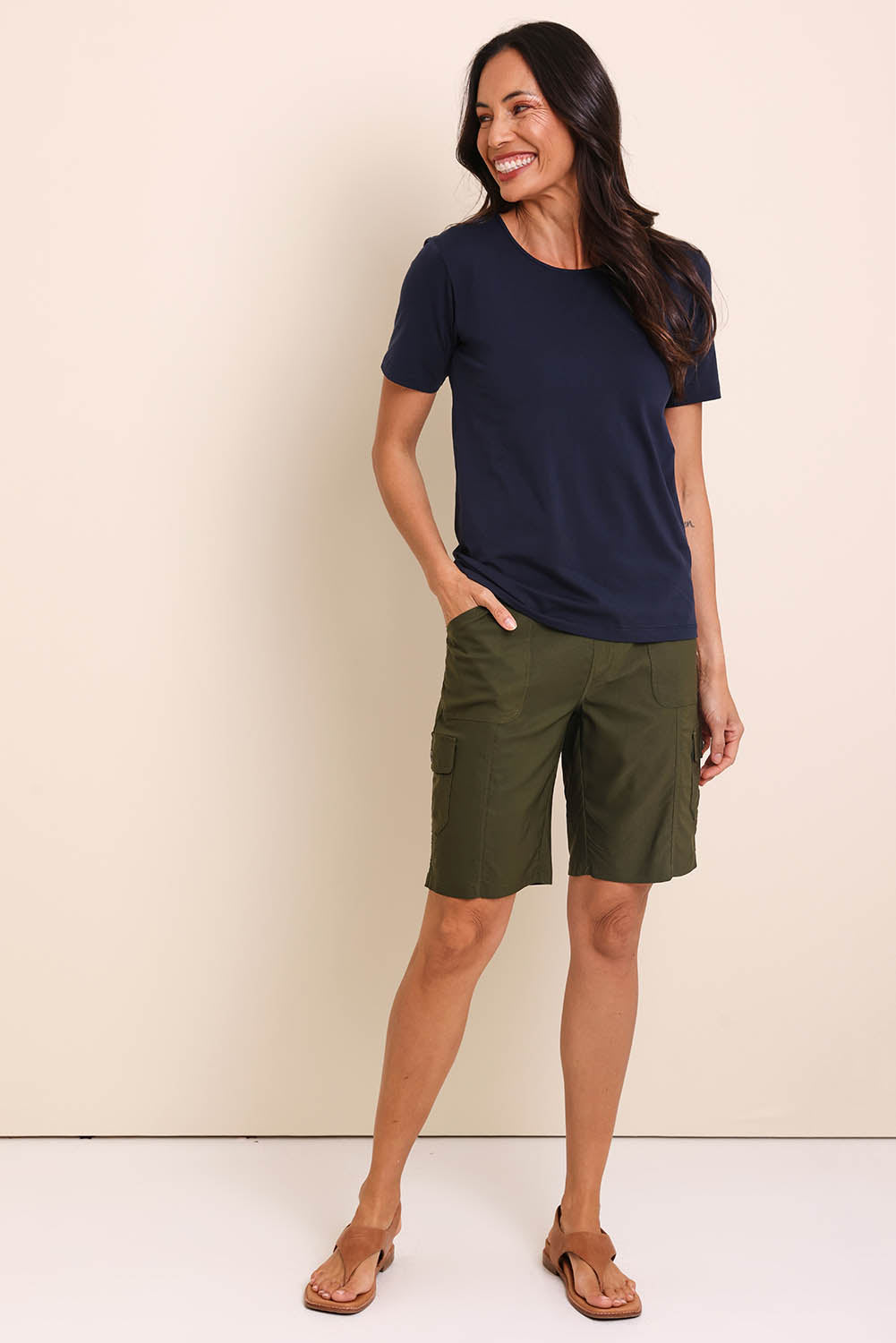 Model Amandam wearing size 10 of the The Utility Shorts  - Olive in colour Olive, from the front