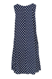 Product shot of The Keepers Lined Swing Dress in colour Navywhite (Blue), from the back