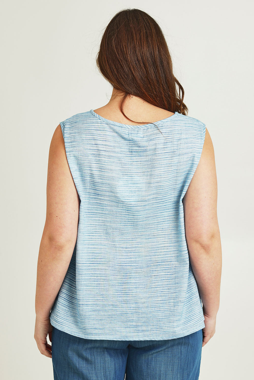 Model Jane wearing size 14 of The Summer Striped Tank in colour Bluestripe (Blue), from the back