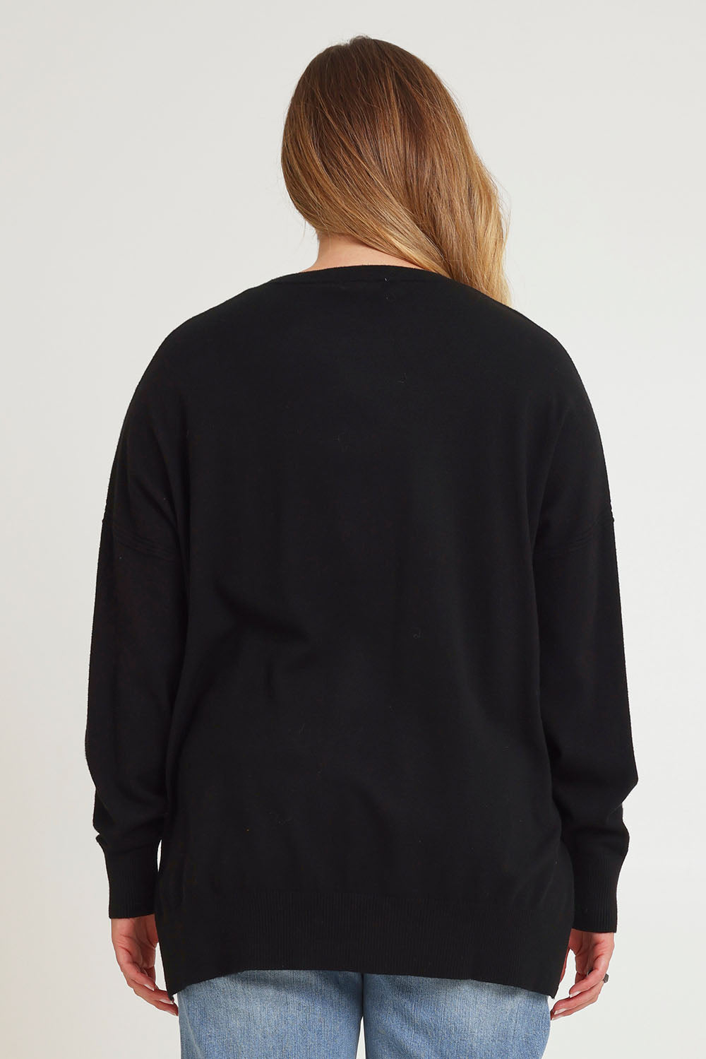 Model Chanel wearing size XL of The Modal Blend Crew Neck Jumper in colour Black (Black), from the back