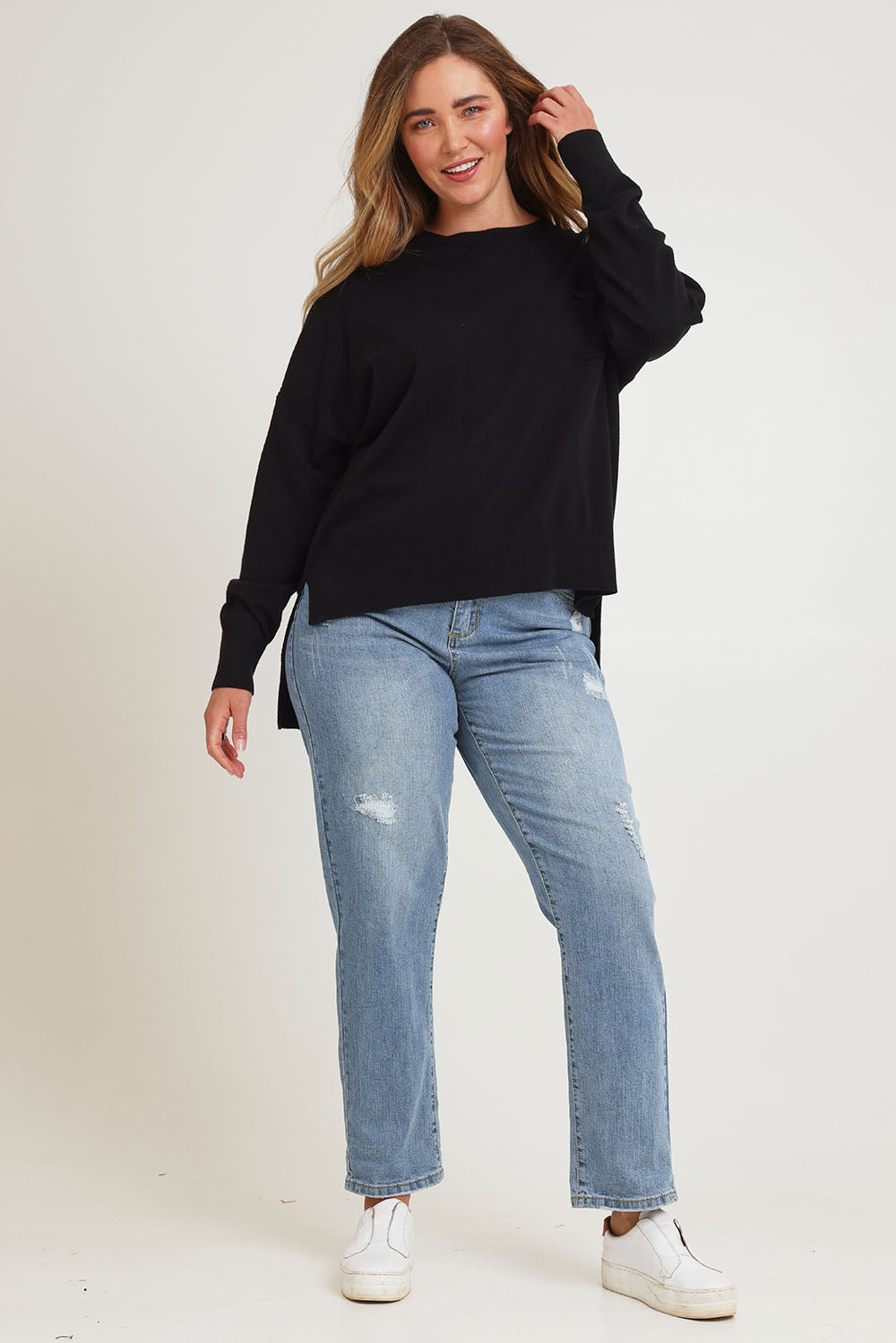 Model Chanel wearing size XL of The Modal Blend Crew Neck Jumper in colour Black (Black), from the front, showing the whole outfit