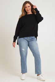 Model Chanel wearing size XL of The Modal Blend Crew Neck Jumper in colour Black (Black), from the front, showing the whole outfit