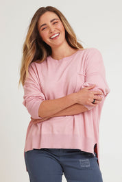 Model Chanel wearing size XL of The Modal Blend Crew Neck Jumper in colour Rosepink (Pink), from the front, cropped image