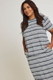 Model Ashleigh wearing size 16 of The Striped Raglan Sleeve Tee in colour Navystripe (Blue), from the front, cropped image