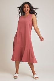 Model Terri-Leigh wearing size 14 of The Cotton Flounce Dress in colour Rose (Pink), from the front, showing the whole outfit