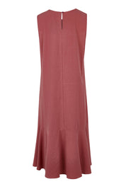 Product shot of The Cotton Flounce Dress in colour Rose (Pink), from the back