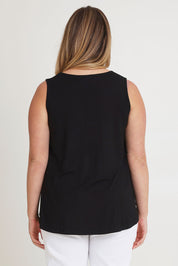 Model Chanel wearing size 16 of The Pack & Go Luxe Bamboo Swing Tank in colour Black (Black), from the back