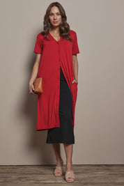 Model Madeline wearing size 10 of The Pack & Go Luxe Bamboo Pull On Maxi Skirt in colour Black (Black), from the front, showing the whole outfit