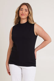 Model Chanel wearing size S of The Modal Blend Mockturtle Vest in colour Black (Black), from the front, cropped image