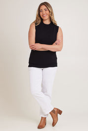 Model Chanel wearing size XL of The Modal Blend Mockturtle Vest in colour Black (Black), from the front, showing the whole outfit