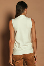 Model Madeline wearing size S of The Modal Blend Mockturtle Vest in colour White (White), from the back