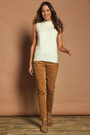 Model Madeline wearing size S of The Modal Blend Mockturtle Vest in colour White (White), from the front, showing the whole outfit