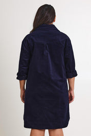 Model Ashleighf wearing size 16 of the The Cord Shacket Dress With Pockets – Darknavy in colour Darknavy, from the back
