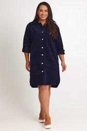 Model Ashleighf wearing size 16 of the The Cord Shacket Dress With Pockets – Darknavy in colour Darknavy, from the front