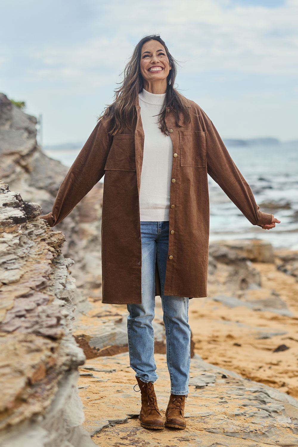 Model Amanda wearing size 10 of The Cord Shacket Dress With Pockets in colour Mushroom, from the front, showing the whole outfit