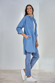 Model Amanda wearing size 10 of The Printed Denim Shacket Dress With Pockets in colour Denimspot (Blue), from the front, showing the whole outfit